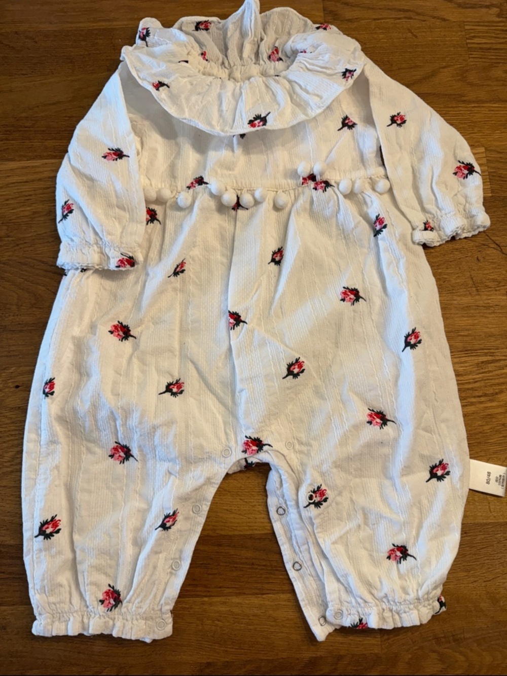 White Floral Baby Romper with Pom Trim